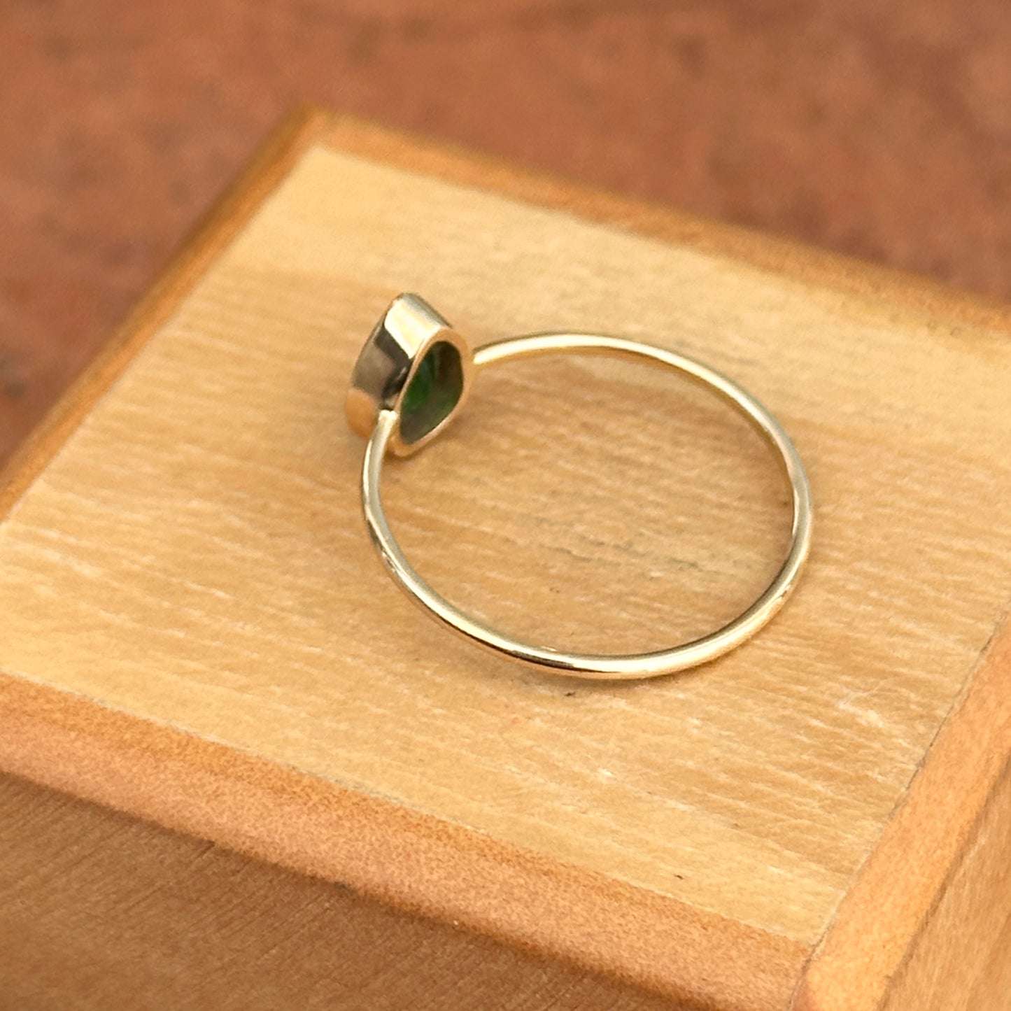 14KT Yellow Gold .65 CT Pear Emerald Bezel Ring