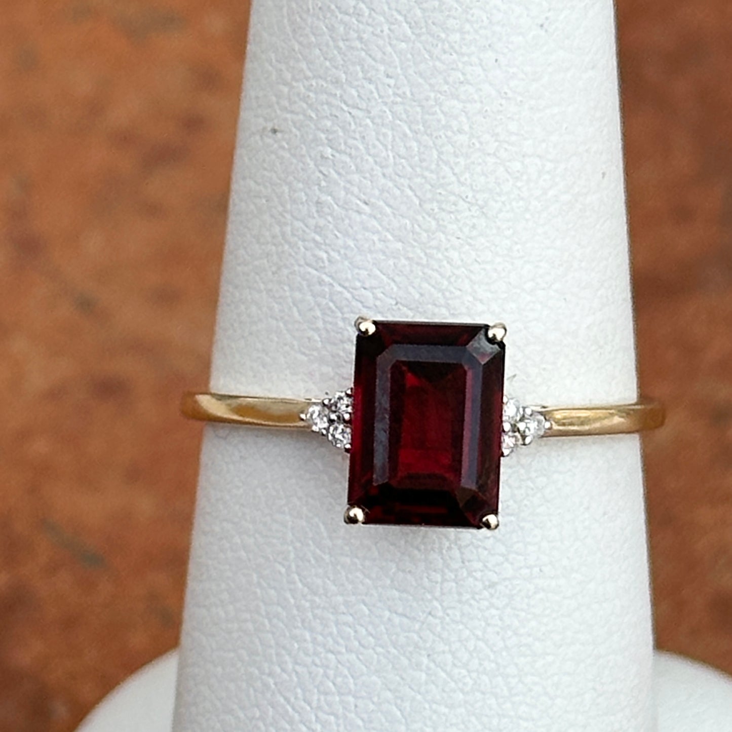 14KT Yellow Gold Emerald Cut Garnet Round Full Cut Diamonds Ring