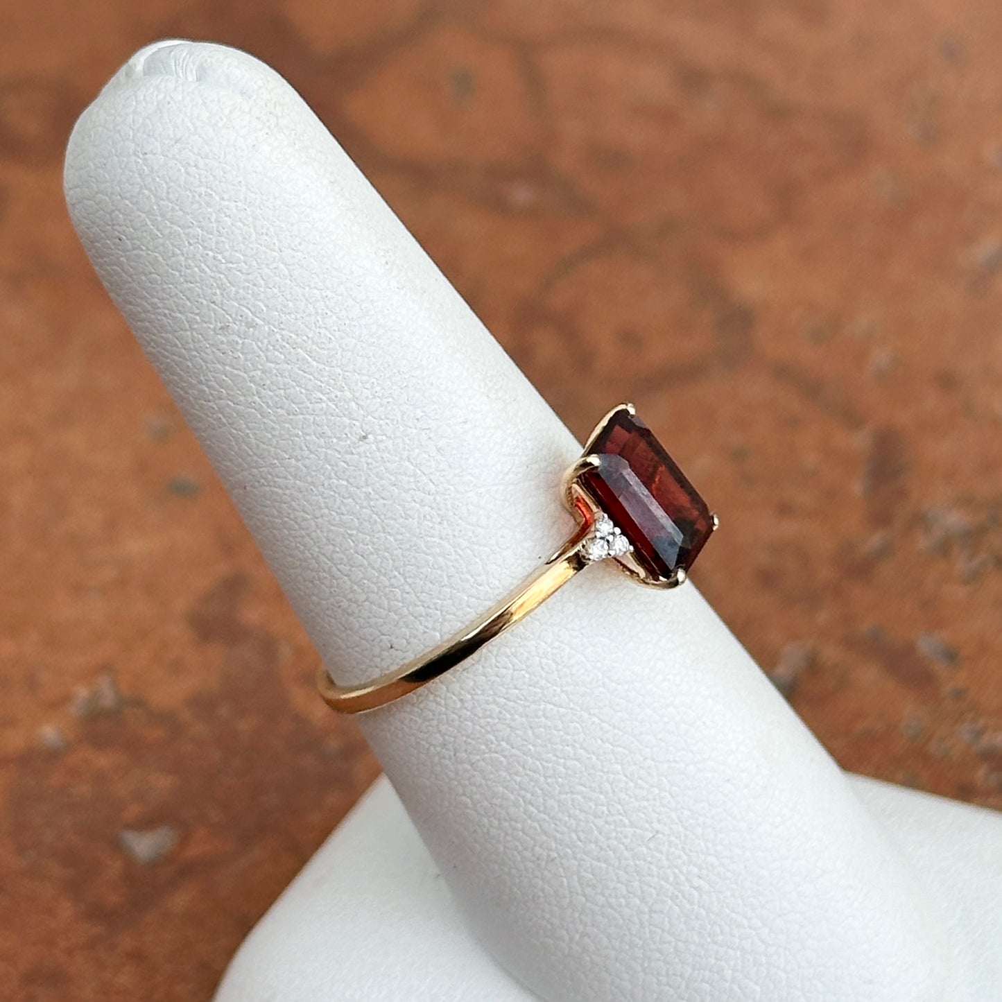 14KT Yellow Gold Emerald Cut Garnet Round Full Cut Diamonds Ring