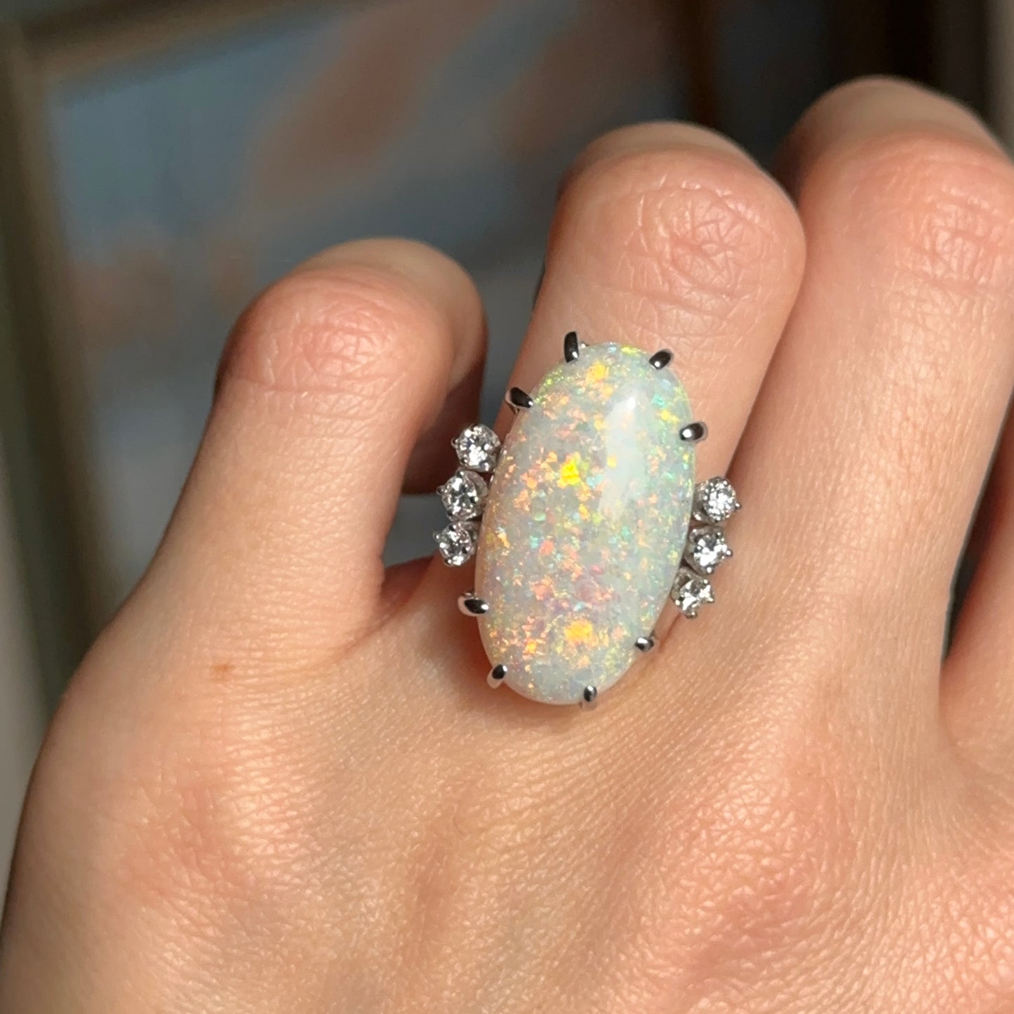 Estate 18KT White Gold Oval Opal + Diamond ring