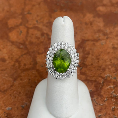 Estate 14KT White Gold Oval 5.3 CT Peridot + Diamond Halo Ring