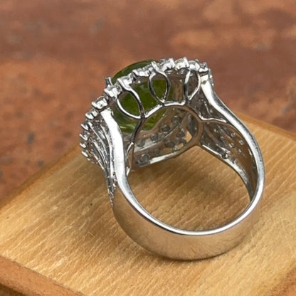 Estate 14KT White Gold Oval 5.3 CT Peridot + Diamond Halo Ring