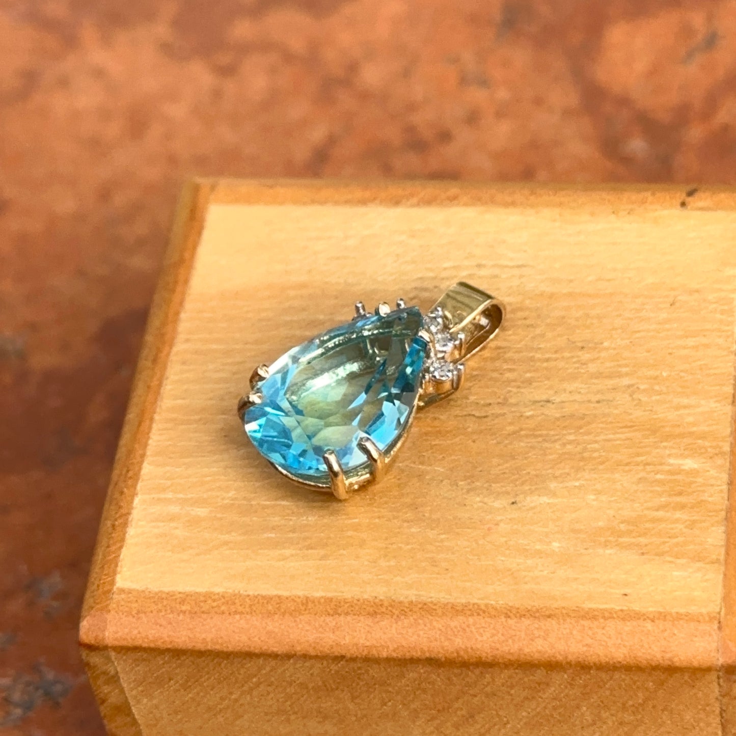 Estate 14KT Yellow Gold Pear Blue Topaz + Diamond Pendant