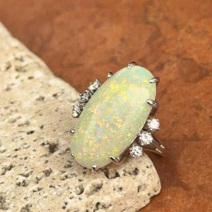 Estate 18KT White Gold Oval Opal + Diamond ring