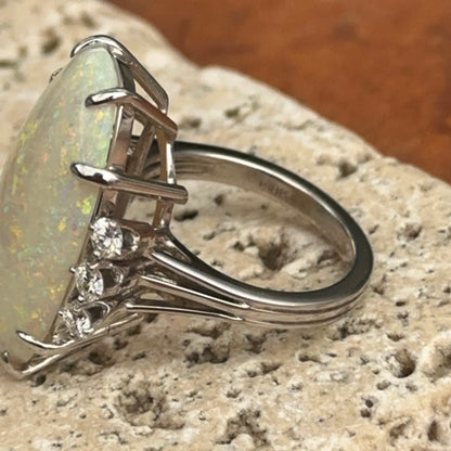 Estate 18KT White Gold Oval Opal + Diamond ring