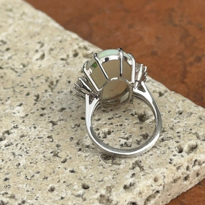 Estate 18KT White Gold Oval Opal + Diamond ring