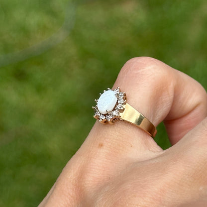 Estate 10KT Yellow Gold Oval Opal + Diamond Halo Ring