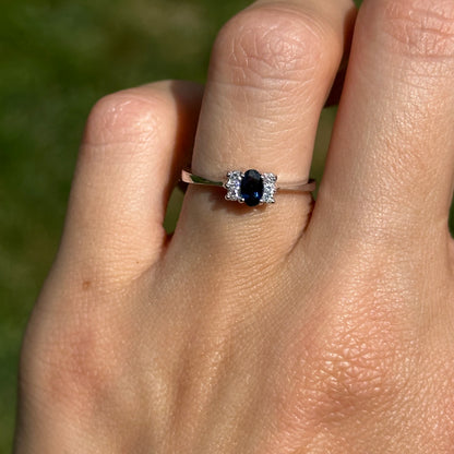 Estate 14KT White Gold Oval Blue Sapphire + Diamond Half-Halo Ring