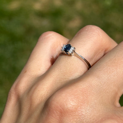 Estate 14KT White Gold Oval Blue Sapphire + Diamond Half-Halo Ring