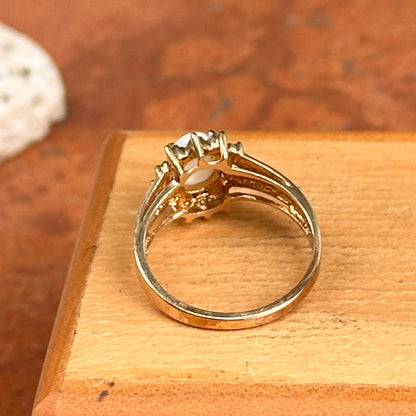 Estate 10KT Yellow Gold Oval Opal + Diamond Halo Ring
