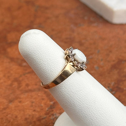 Estate 10KT Yellow Gold Oval Opal + Diamond Halo Ring
