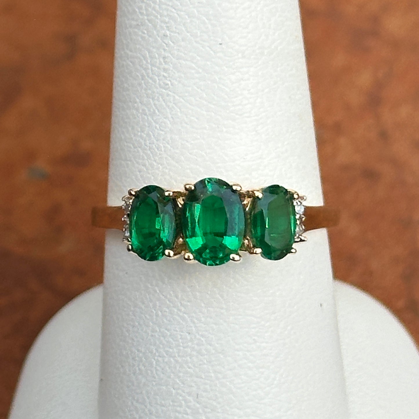 Estate 14KT Yellow Gold Three Stone Oval Lab Emerald + Diamond Ring