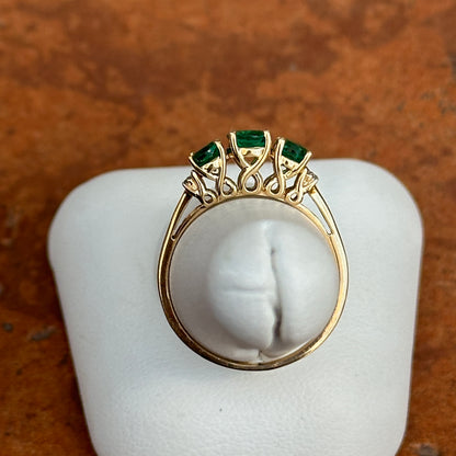 Estate 14KT Yellow Gold Three Stone Oval Lab Emerald + Diamond Ring