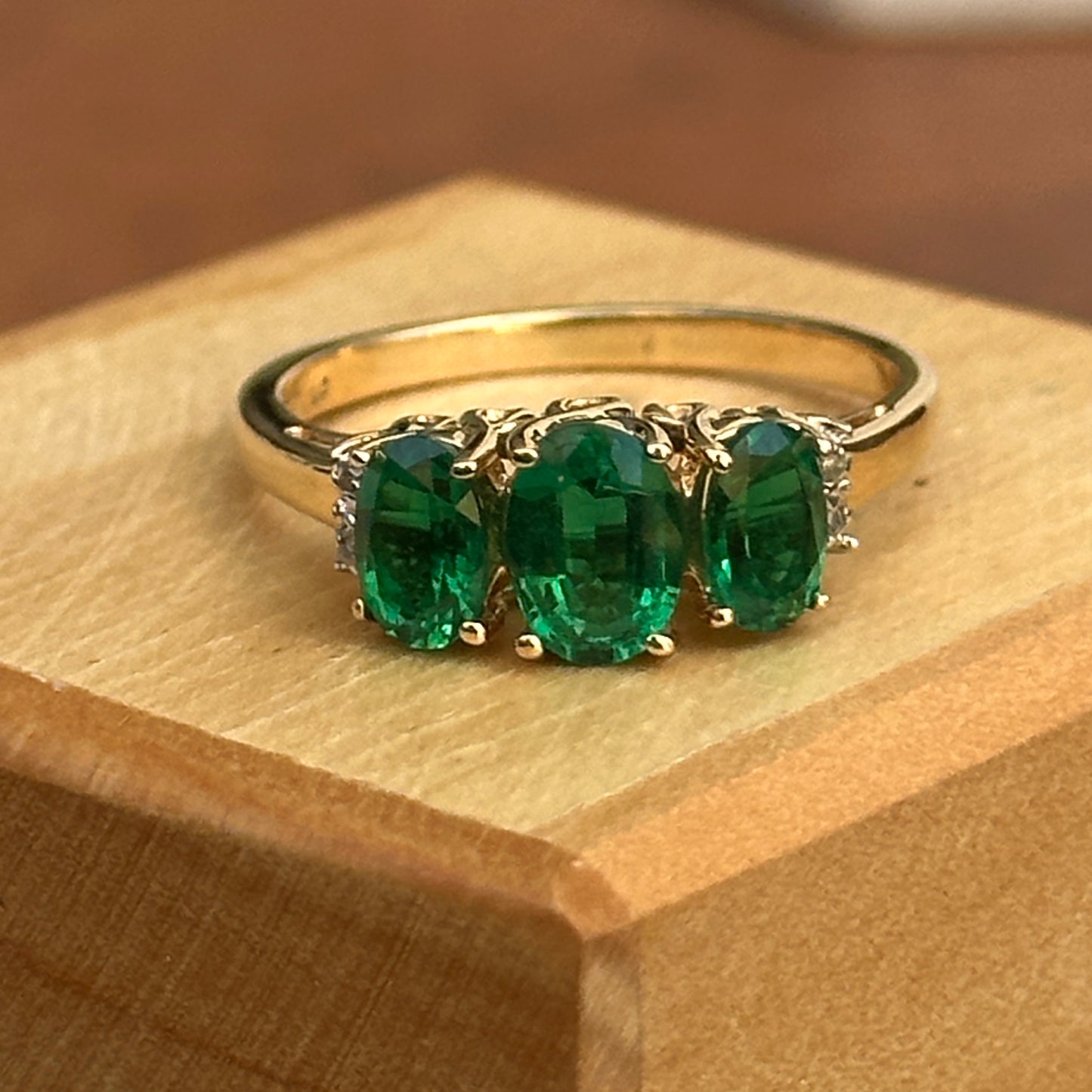 Estate 14KT Yellow Gold Three Stone Oval Lab Emerald + Diamond Ring