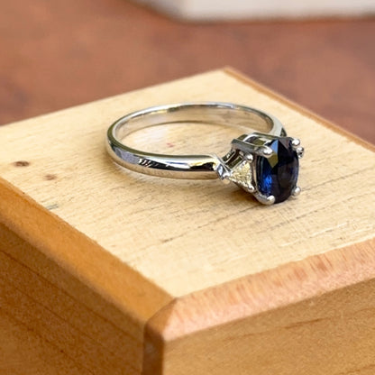 10KT White Gold Oval .97 CT Blue Sapphire + Trillion Diamond Ring