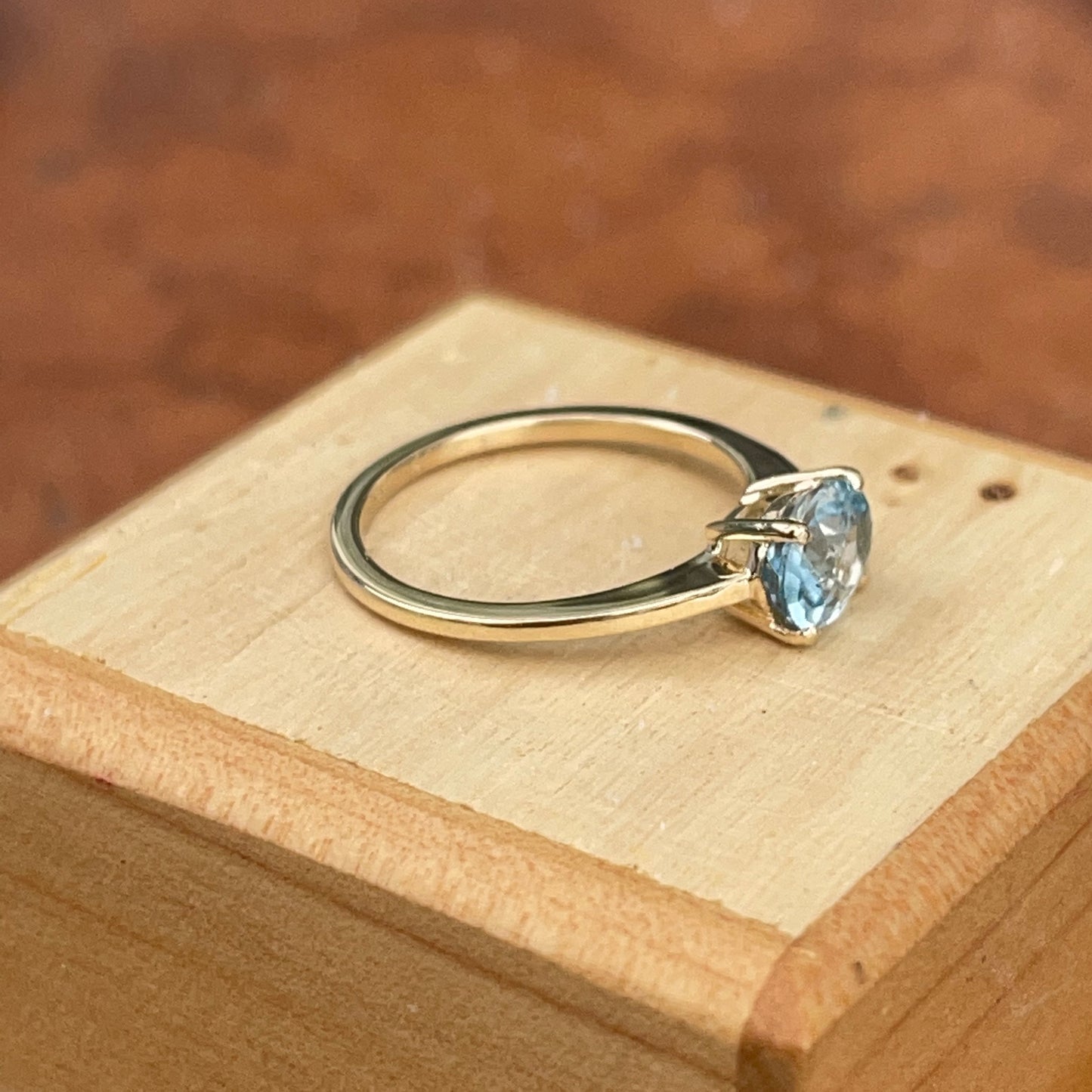 14KT Yellow Gold East-West Aquamarine Solitaire Ring