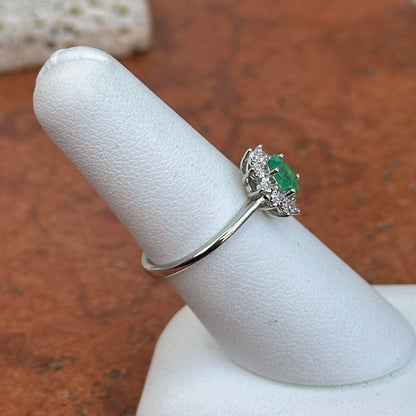 Estate  14KT White Gold Oval Emerald + Diamond Halo Ring