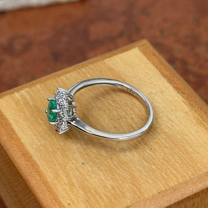 Estate  14KT White Gold Oval Emerald + Diamond Halo Ring