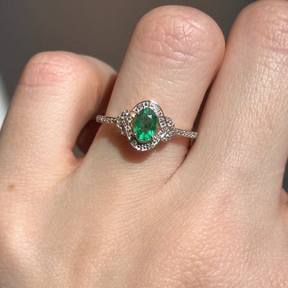 Estate 14KT Yellow Gold Oval Emerald + Round Diamond Halo Ring