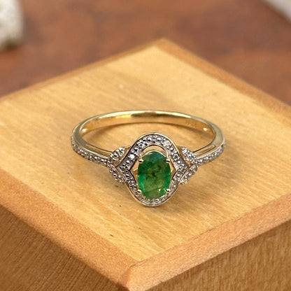 Estate 14KT Yellow Gold Oval Emerald + Round Diamond Halo Ring