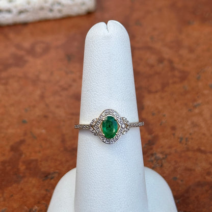 Estate 14KT Yellow Gold Oval Emerald + Round Diamond Halo Ring