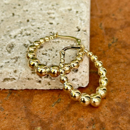 14KT Yellow Gold Graduated Puffed Bead Hoop Earrings 25mm