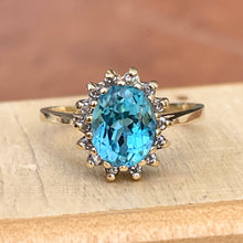 Load image into Gallery viewer, Estate 10KT Yellow Gold Oval Blue Topaz + Diamond Halo Ring
