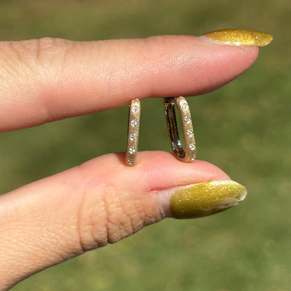 14KT Yellow Gold Brushed Round Diamond Oval Huggie Earrings