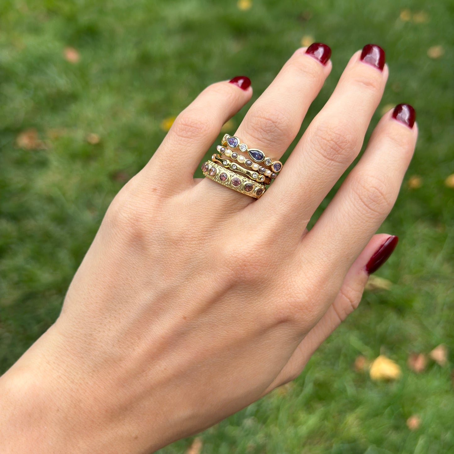 Yellow Gold-Plated Synthetic Tanzanite, Brown Gemstone, Cubic Zirconia, Black and White Pearl Bead Stackable Ring Set