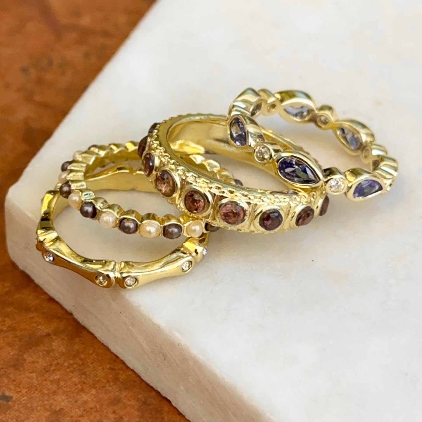 Yellow Gold-Plated Synthetic Tanzanite, Brown Gemstone, Cubic Zirconia, Black and White Pearl Bead Stackable Ring Set