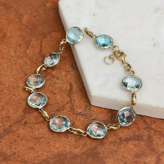 14KT Yellow Gold Checkerboard Faceted Blue Topaz Bezel Set Bracelet