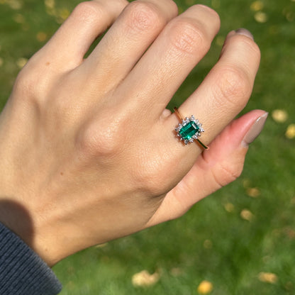 Estate 10KT Yellow Gold .95 CT Emerald-Cut Emerald + Diamond Halo Ring