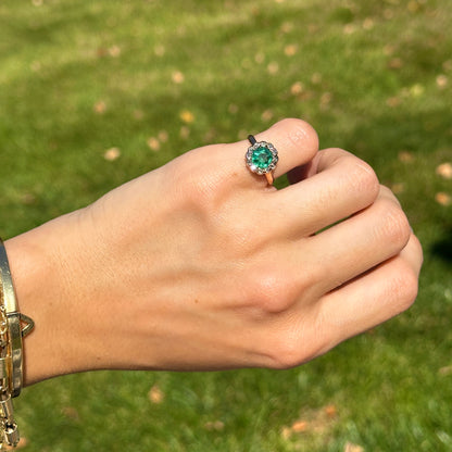 Estate 9KT Yellow Gold Round Emerald + Diamond Halo Ring