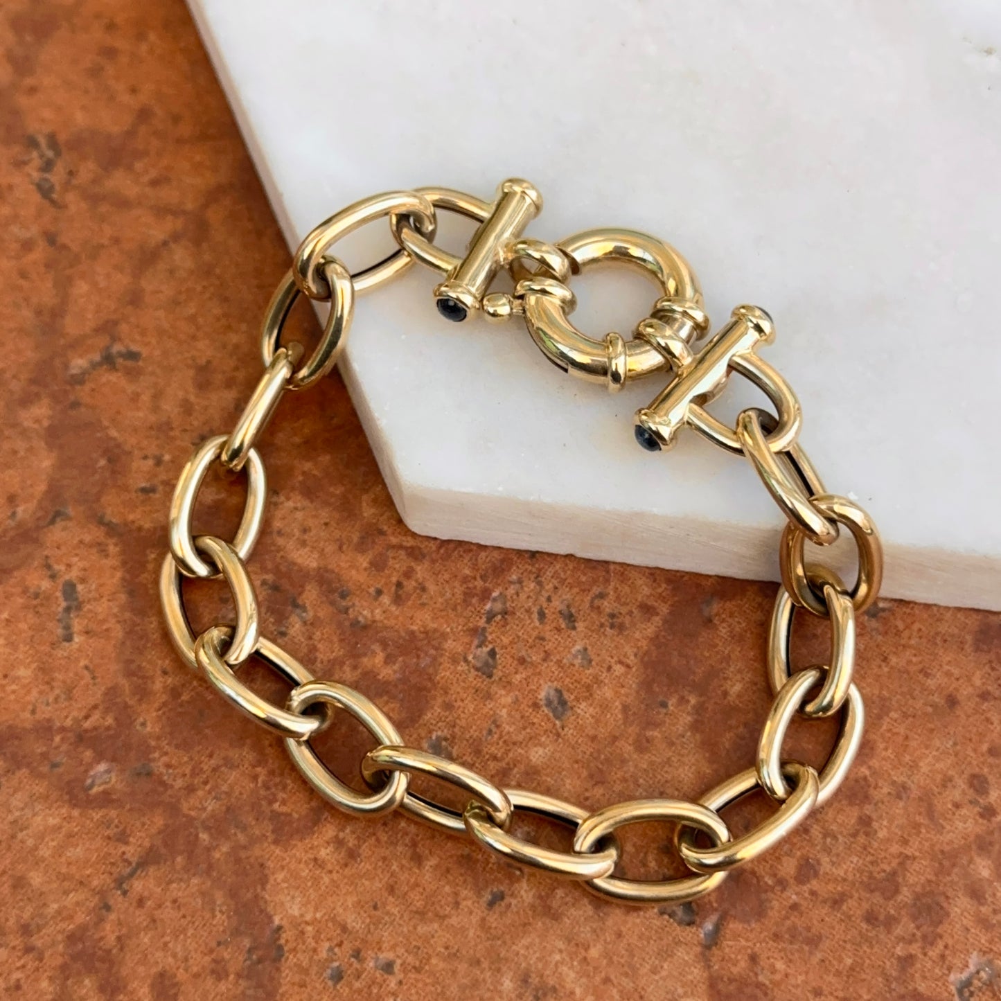 Estate 14KT Yellow Gold Oval Link Toggle Blue Sapphire Ends Bracelet