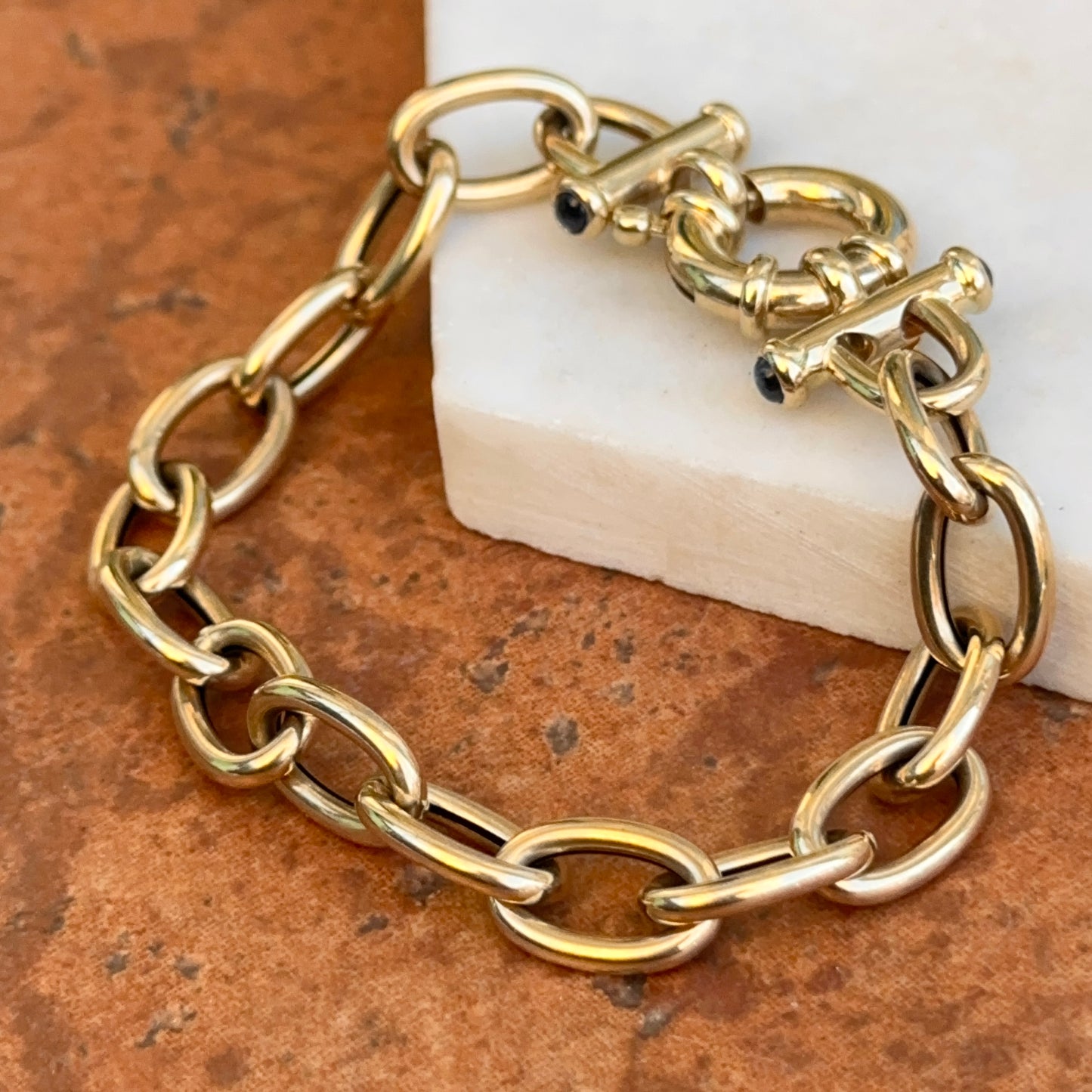 Estate 14KT Yellow Gold Oval Link Toggle Blue Sapphire Ends Bracelet