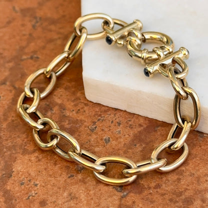 Estate 14KT Yellow Gold Oval Link Toggle Blue Sapphire Ends Bracelet