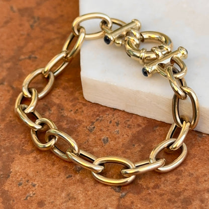 Estate 14KT Yellow Gold Oval Link Toggle Blue Sapphire Ends Bracelet