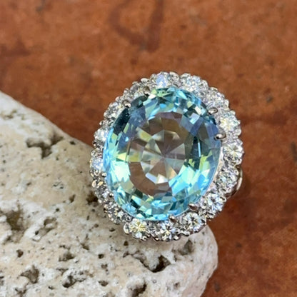 Estate 14KT White Gold Oval 11 CT Aquamarine + Halo Diamond Ring