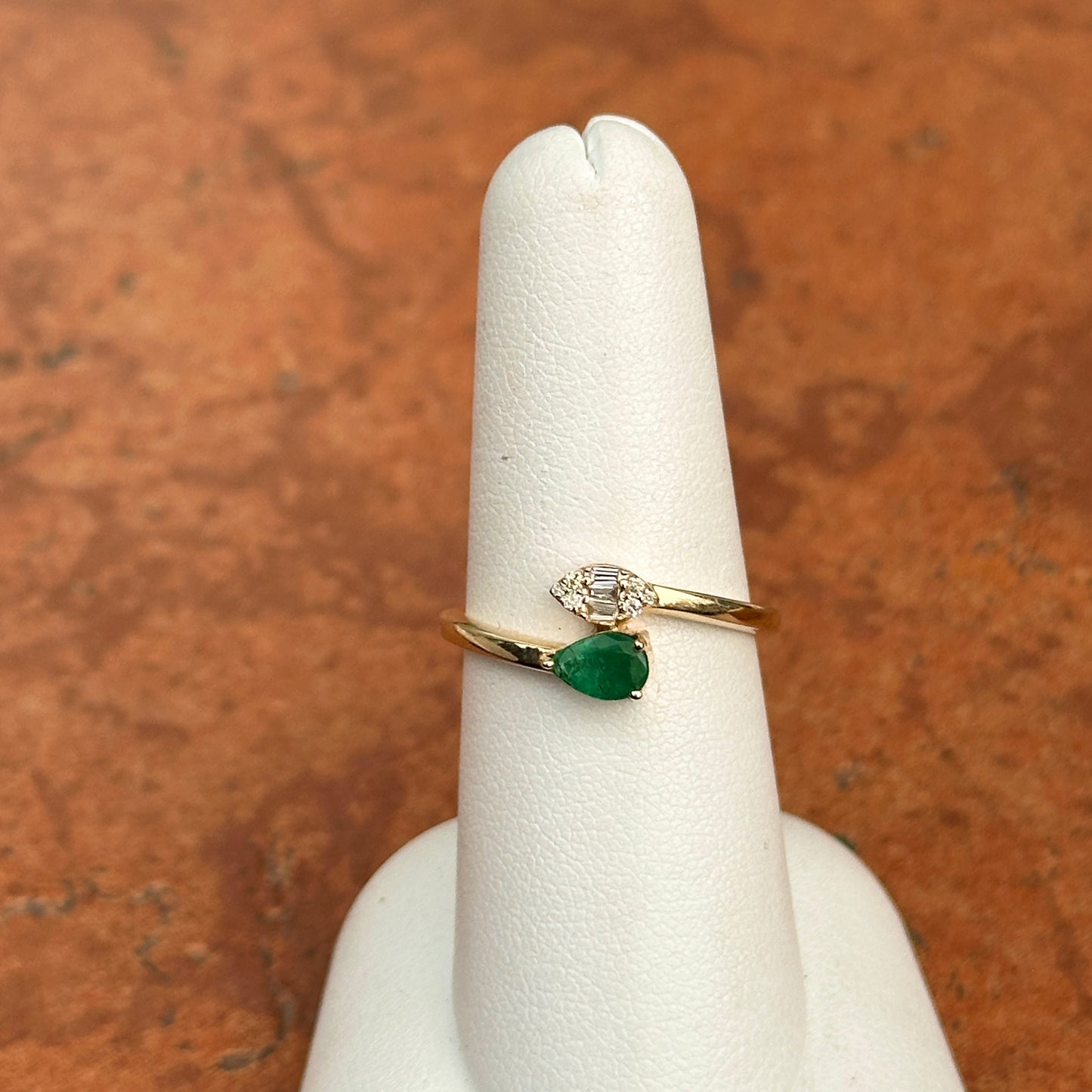14KT Yellow Gold Pear Emerald + Baguette Diamond Bypass Ring