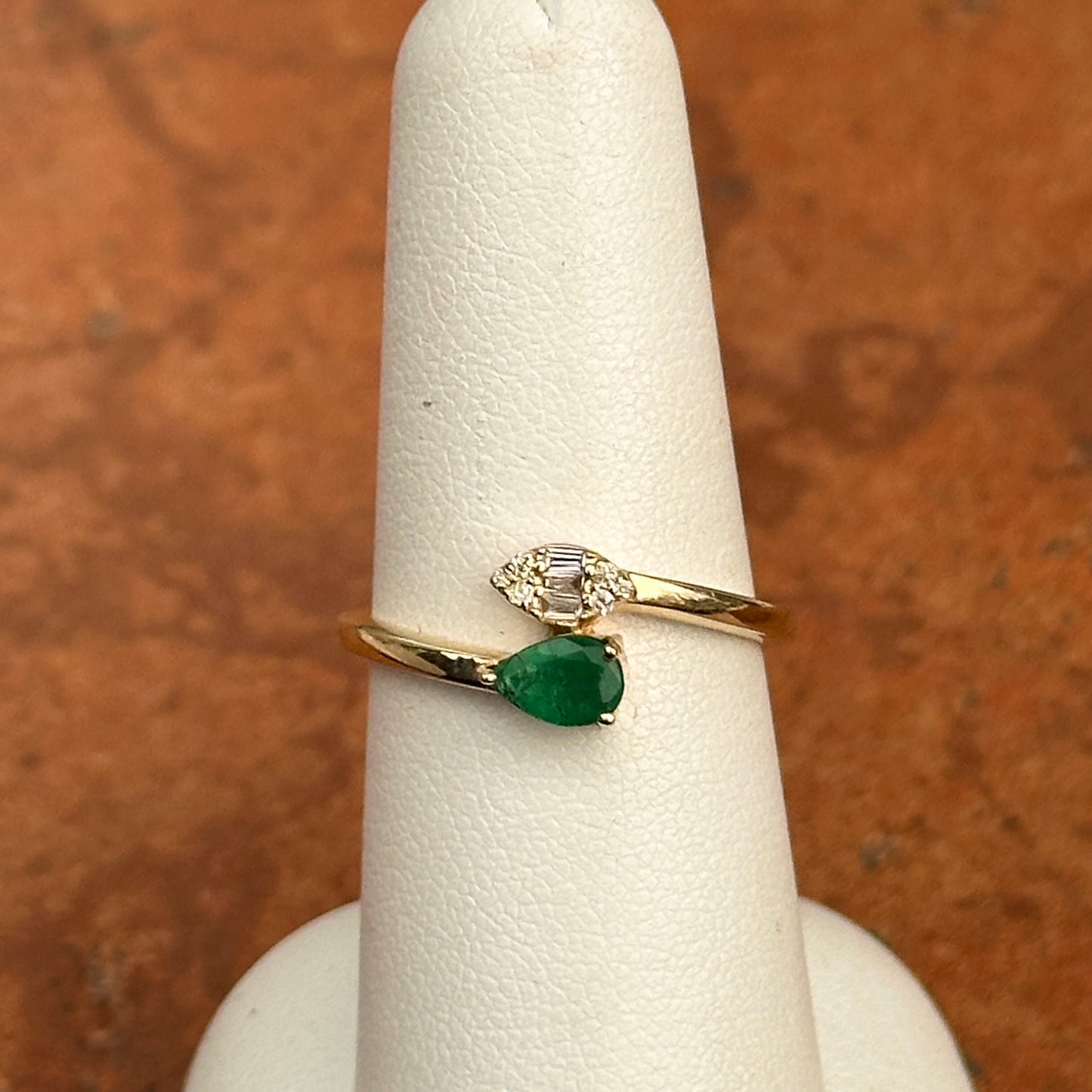 14KT Yellow Gold Pear Emerald + Baguette Diamond Bypass Ring