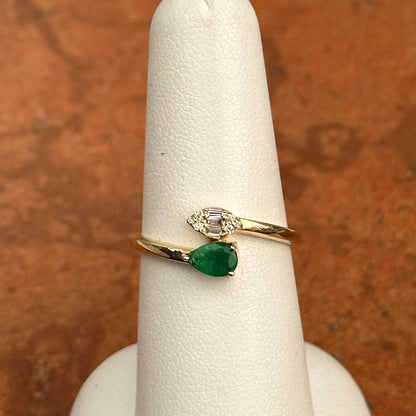 14KT Yellow Gold Pear Emerald + Baguette Diamond Bypass Ring
