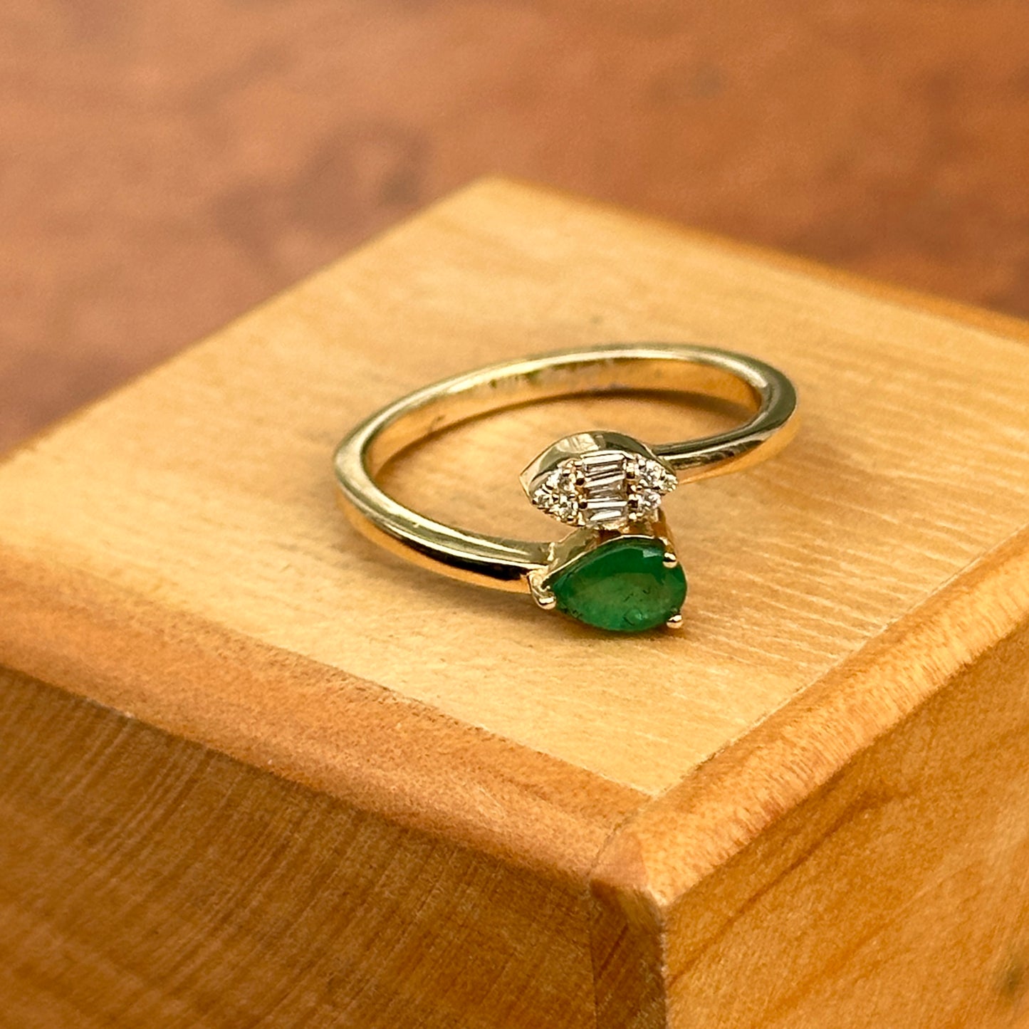 14KT Yellow Gold Pear Emerald + Baguette Diamond Bypass Ring