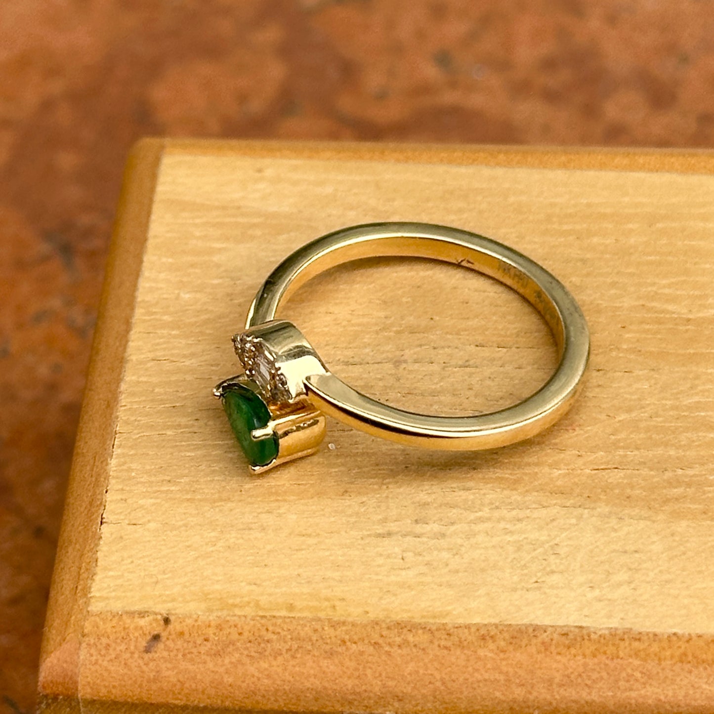 14KT Yellow Gold Pear Emerald + Baguette Diamond Bypass Ring