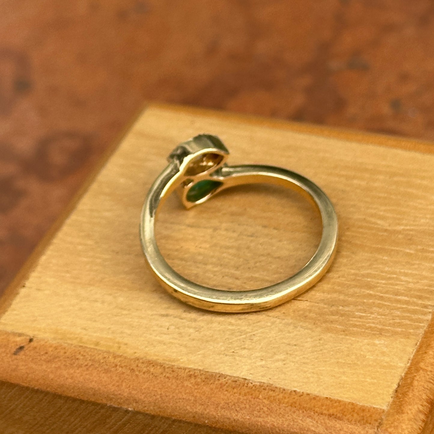 14KT Yellow Gold Pear Emerald + Baguette Diamond Bypass Ring