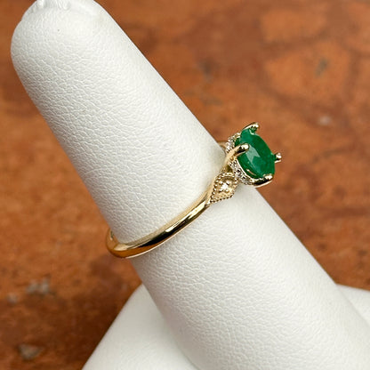14KT Yellow Gold Oval .69 CT Colombian Emerald + Diamond Accent Ring