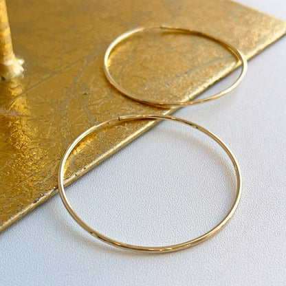 10KT Yellow Gold Shiny Finish Thin 1.50mm Small Hoop Earrings 51mm