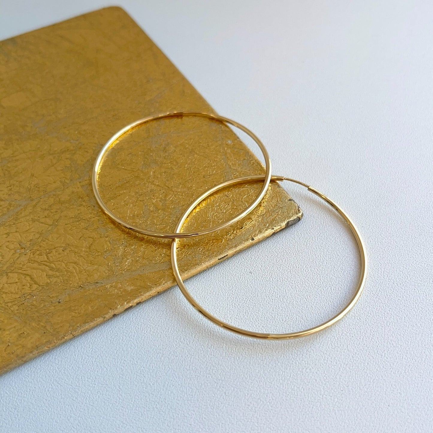 10KT Yellow Gold Shiny Finish Thin 1.50mm Small Hoop Earrings 51mm