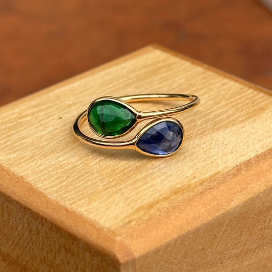 18KT Yellow Gold Pear Emerald + Blue Sapphire Bypass Ring