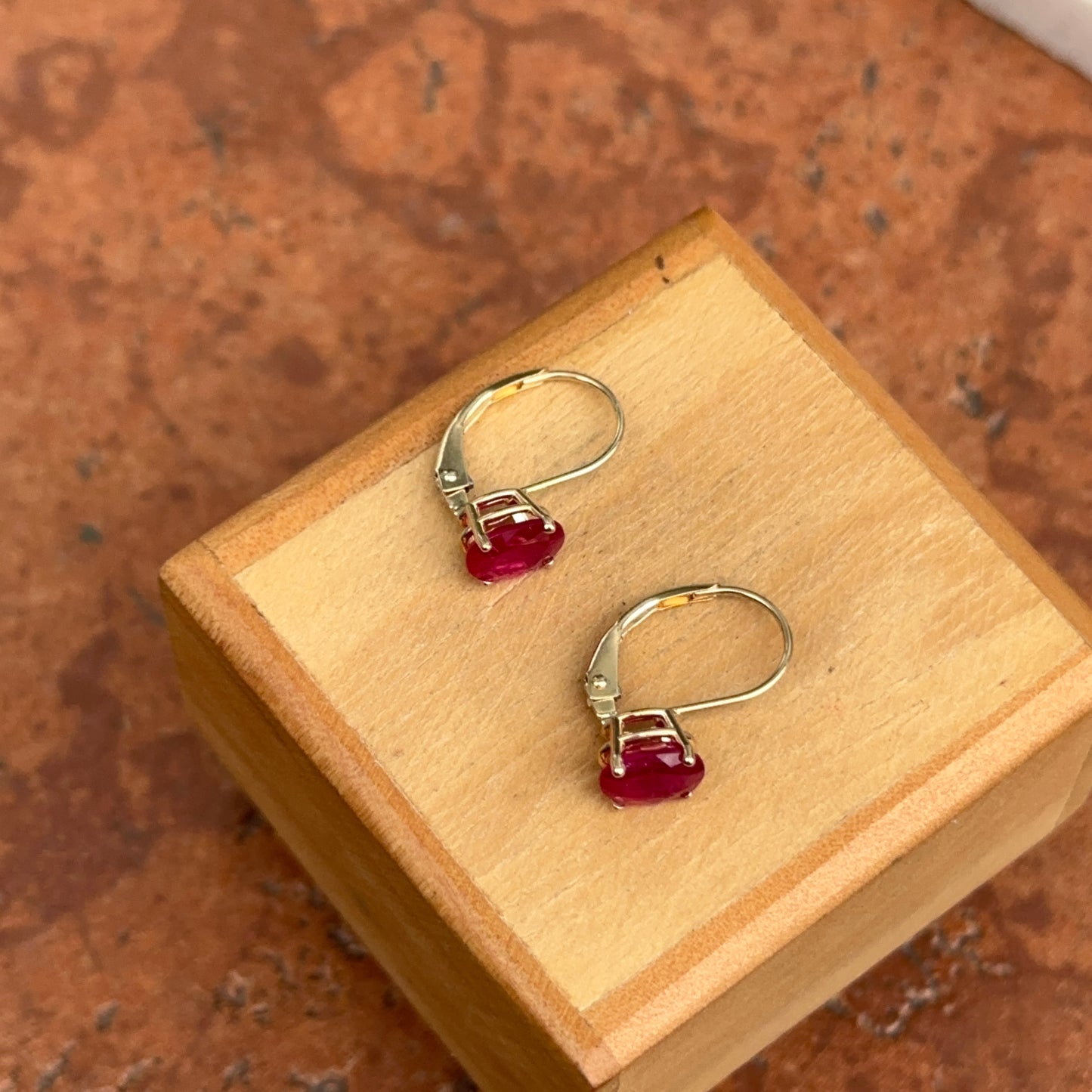 14KT Yellow Gold Faceted Oval Ruby Leverback Earrings