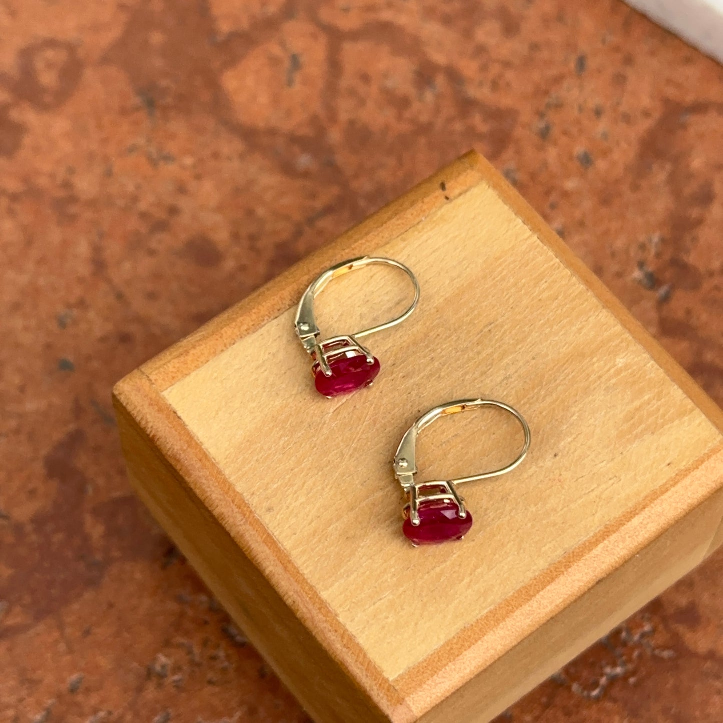 14KT Yellow Gold Faceted Oval Ruby Leverback Earrings